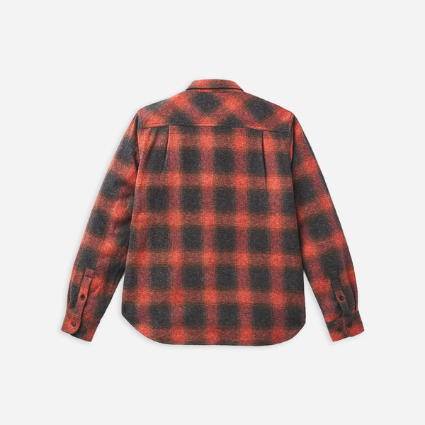 A long-sleeve plaid flannel shirt shown from the back, featuring a red and black checkered pattern on a light gray background.
