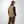 Load image into Gallery viewer, Man wearing a brown puffer vest, black shirt, and green cap on a white background
