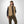 Load image into Gallery viewer, Man wearing a tan vest over a black shirt and brown pants on a white background
