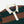 Load image into Gallery viewer, Drake's Block Stripe Knitted Rugby - Green &amp; Brown
