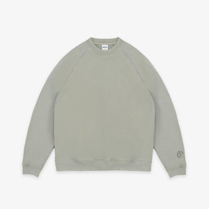 Dubbleware - Dubbleware Vintage Dye Sweatshirt - Washed Green - A light sage green crewneck sweatshirt with raglan sleeves, laid flat against a clean white background. - Main Front View