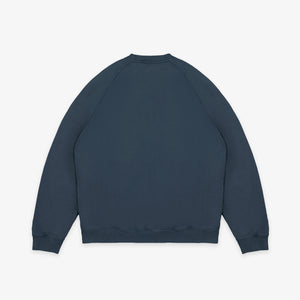 Dubbleware - Dubbleware Vintage Dye Sweatshirt - Washed Navy - A dark navy blue crewneck sweatshirt shown from the back, laid flat against a light gray background. - Alternative View 1