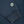 Load image into Gallery viewer, Close-up of a dark slate blue sweatshirt sleeve featuring a circular embroidered 'Dubble Wars' patch on the cuff.
