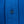 Load image into Gallery viewer, Close-up of a vibrant royal blue textured fabric with vertical stitched channels and a matching dark blue button.
