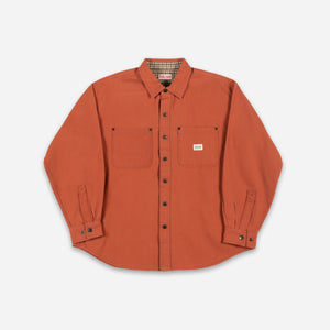 Dubbleware - Dubbleware Lined Snap Overshirt - Dusty Brick Canvas - An orange long-sleeve button-up shirt with two chest pockets, laid flat on a light gray background. - Main Front View