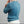 Load image into Gallery viewer, A man wearing a textured blue knit crewneck sweater, shown from the back and side against a plain gray studio background.
