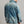 Load image into Gallery viewer, A man wearing a light blue washed denim jacket, shown from the back, paired with off-white trousers against a neutral gray studio background.
