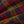 Load image into Gallery viewer, A close-up of a textured, fuzzy plaid fabric with a pattern of dark navy, red, and mustard yellow.
